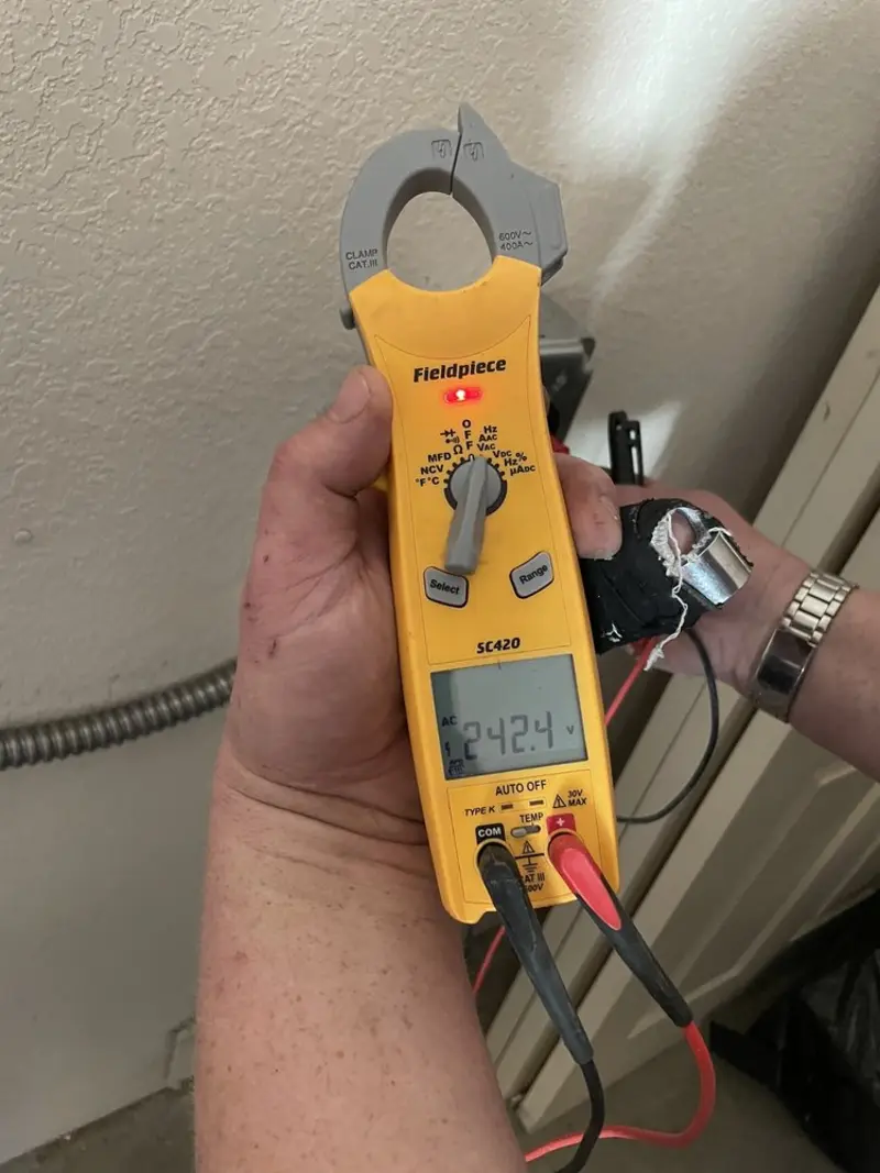 Voltage testing with clamp meter during Circuit Breaker Repair in Columbus